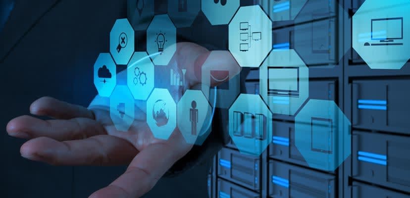 blue-octagons-with-icons-floating-above-human-hand